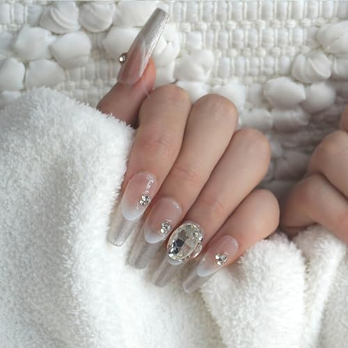 GLORS nails feature a soft pink base with silver tips for refined glamour