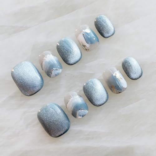GLORS snow mountain nails provide a bold accent compatible with many outfits.