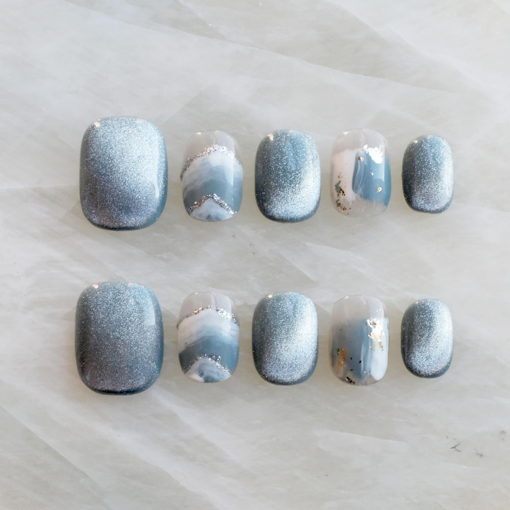 GLORS Purely Handmade press on nails in blue white glitter snow mountain, short square design.