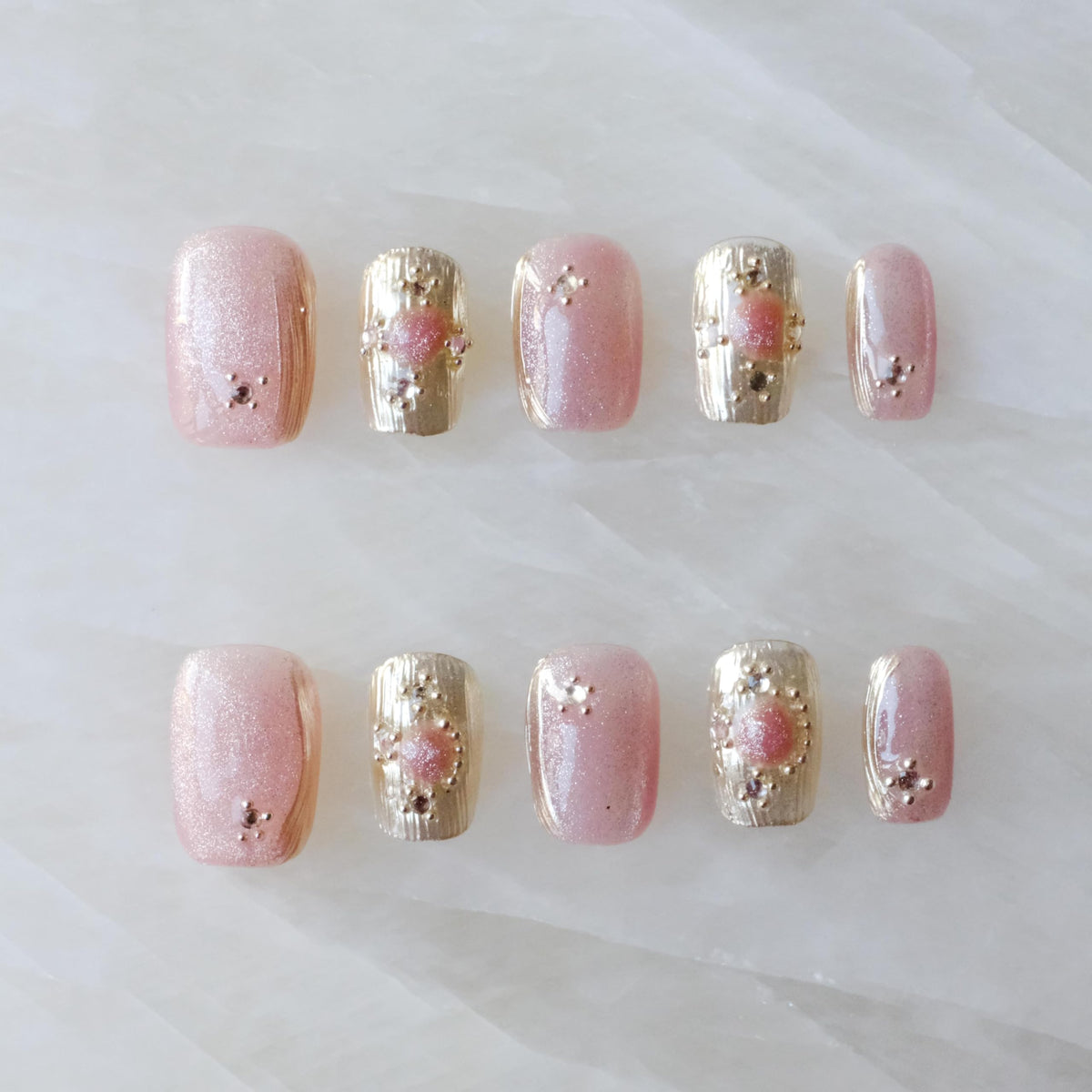 GLORS Purely Handmade Nails with pink-purple cat-eye for chic daily wear