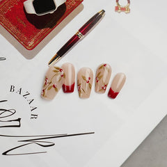 GLORS Purly cherry branch detail on nude base nails for a romantic look