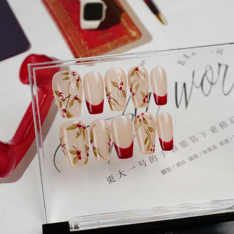 GLORS Purly nails with red French tip and cherry on nude base for everyday glamour