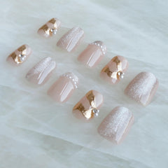 GLORS Rose gold accents add subtle luxury to any manicure.
