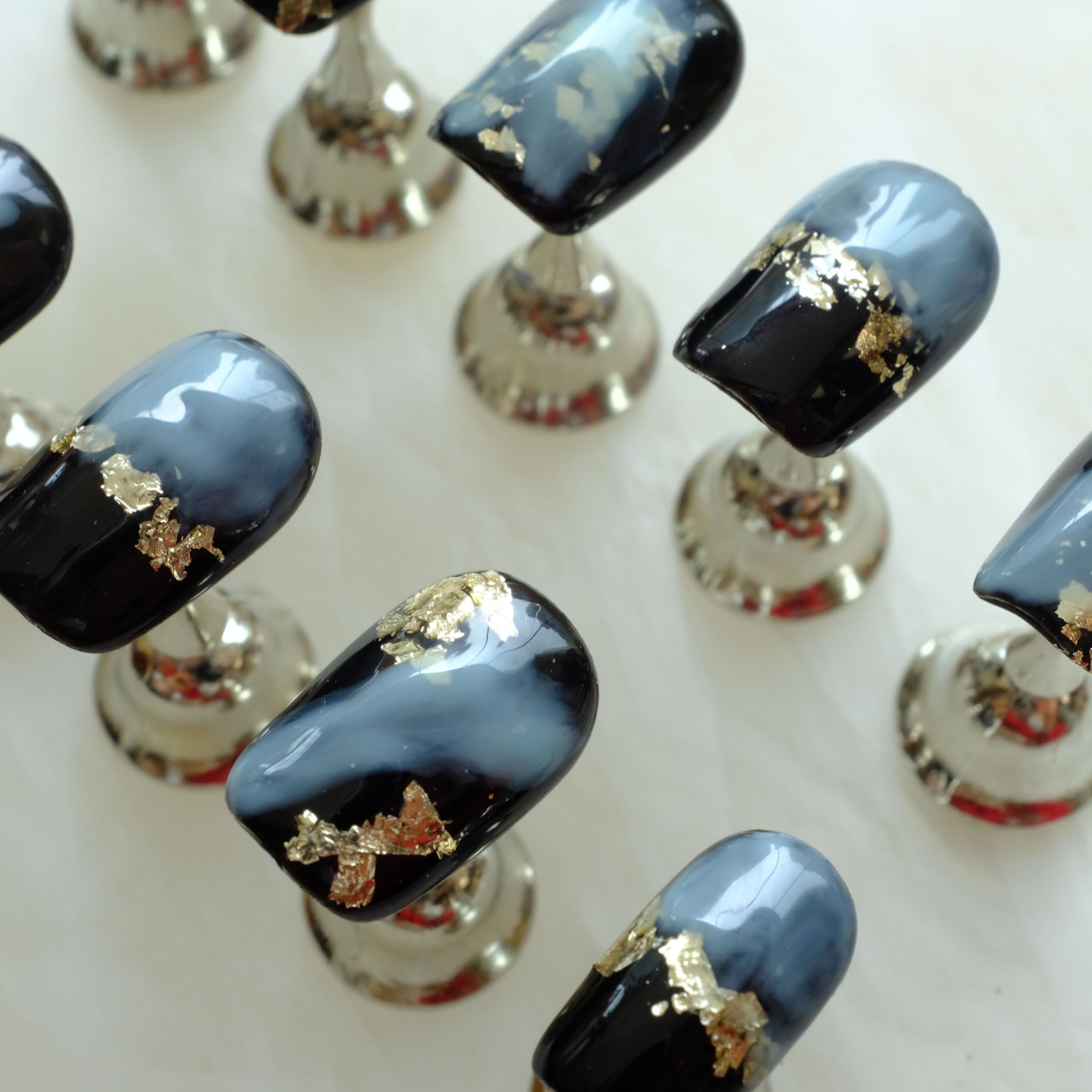 GLORS 10-piece set with varying sizes for precise at-home manicure.