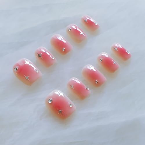 GLORS nails pink base with stars provide a versatile look for day or night wear.