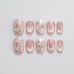 GLORS Unique Art Nail pink cat eye with butterflies and flowers for glamorous everyday style.