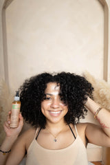 Glossed by Nae Voodoo Hair Growth Oil close-up showing non-greasy texture.