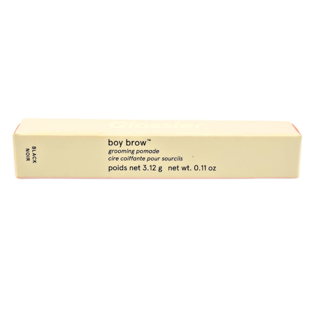 Glossier Boy Brow packaging full-size tube in hand.