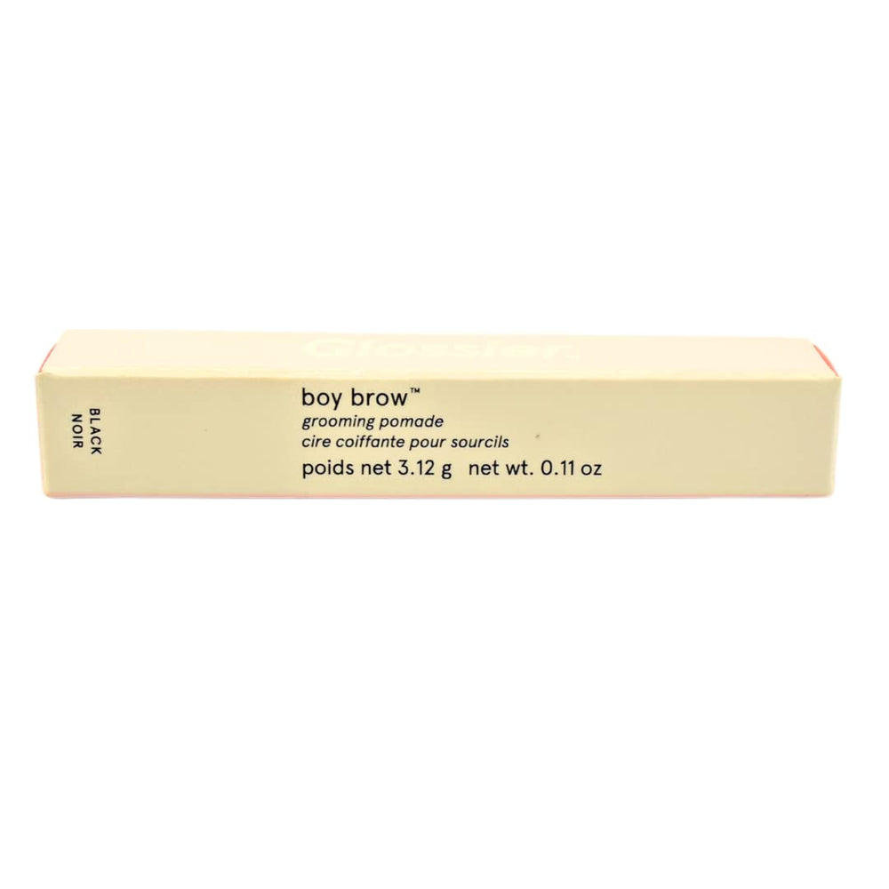 Glossier Boy Brow packaging full-size tube in hand.