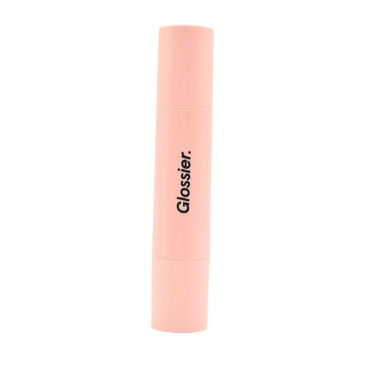 Glossier Cloud Paint dual-ended cheek brush with compact design for precise powder application