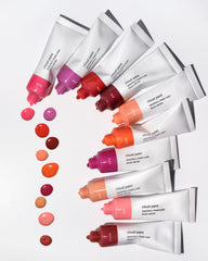 Glossier Cloud Paint Dune portable packaging keeps makeup routine tidy.
