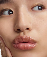 Glossier Balm Dotcom Gingersnap used on cuticles and elbows for dry skin.