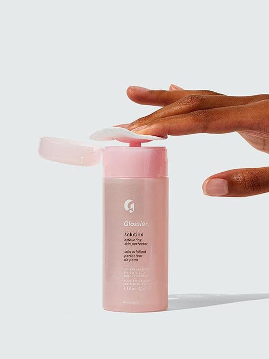 Glossier Solution exfoliating skin perfector bottle for smooth, radiant skin