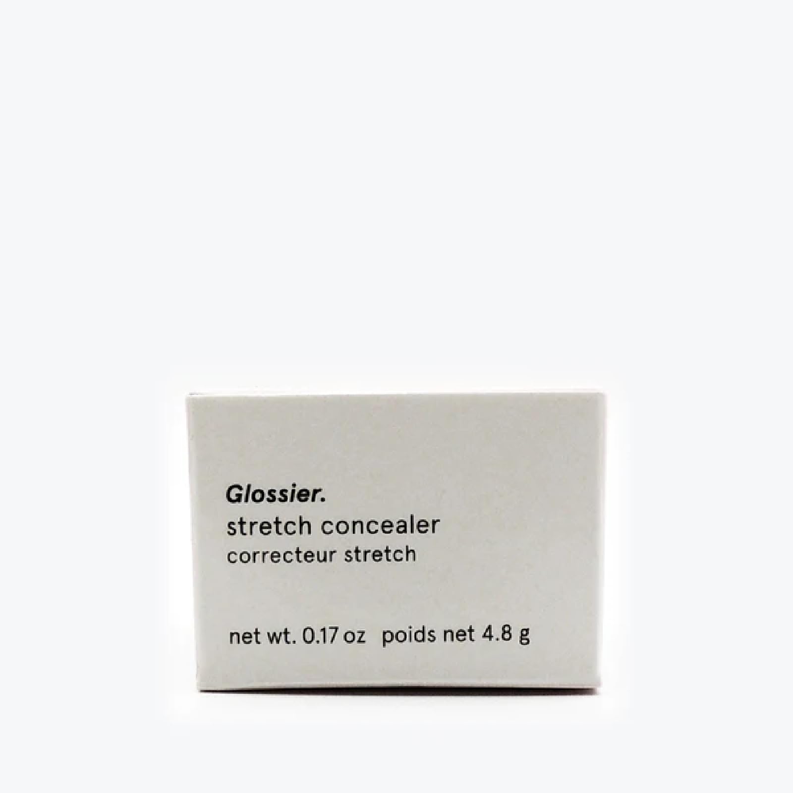 Glossier Stretch Concealer G10 dewy finish blended into skin for brightened, natural look