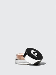 Glossier Stretch Concealer G11 in light neutral texture for seamless coverage.
