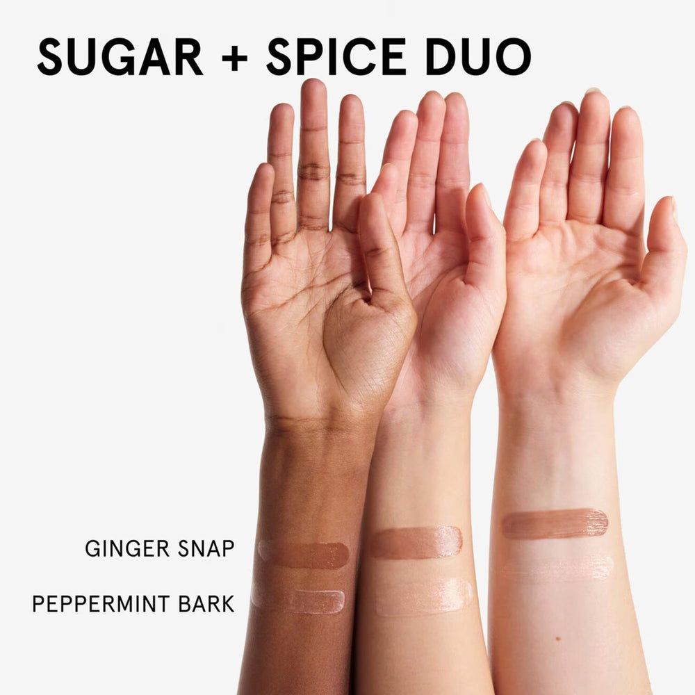 Glossier Sugar and Spice Peppermint Bark tin delivers festive gloss with peppermint scent.