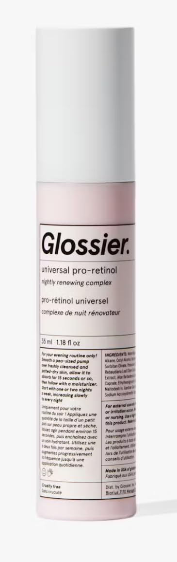 Glossier Universal Pro-Retinol serum bottle for nightly renewal and smoother skin texture.