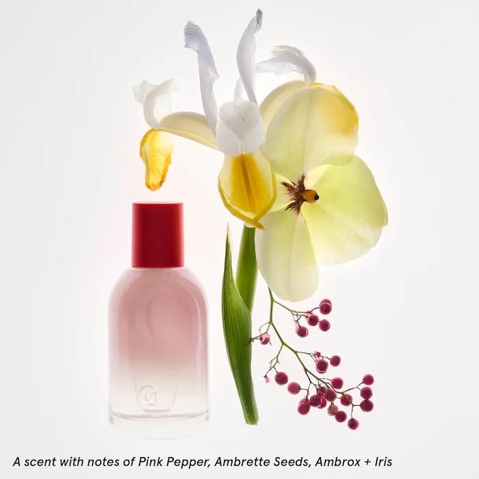 Glossier You packaging with thumbprint detail highlighting premium holiday presentation