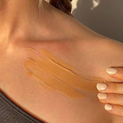 Glowbiotics tinted reef-safe sunscreen application illustrating quick absorption.
