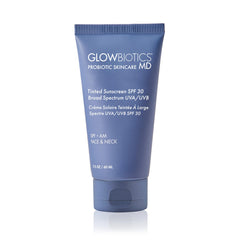 Glowbiotics tinted reef-safe sunscreen bottle with mineral SPF for daily protection.