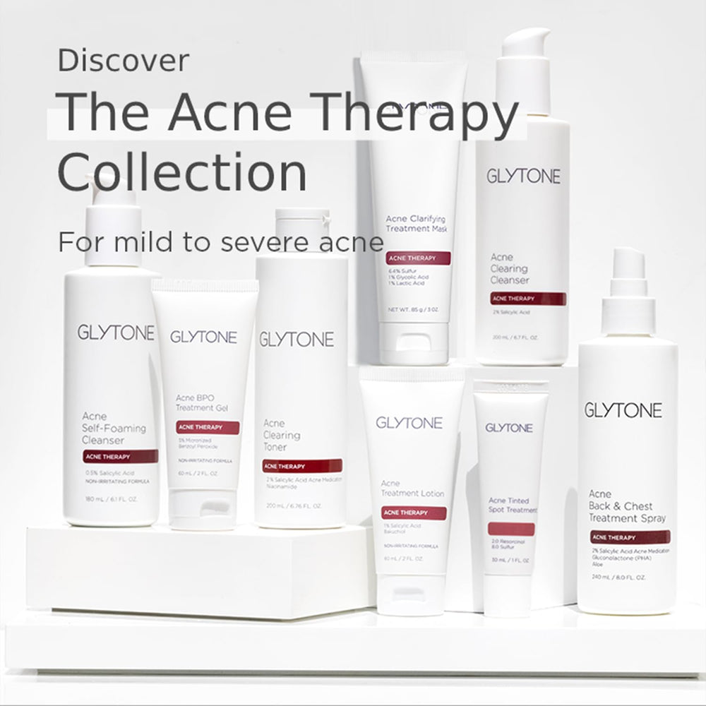 GLYTONE fragrance-free body acne solution in an 8oz bottle for daily use.