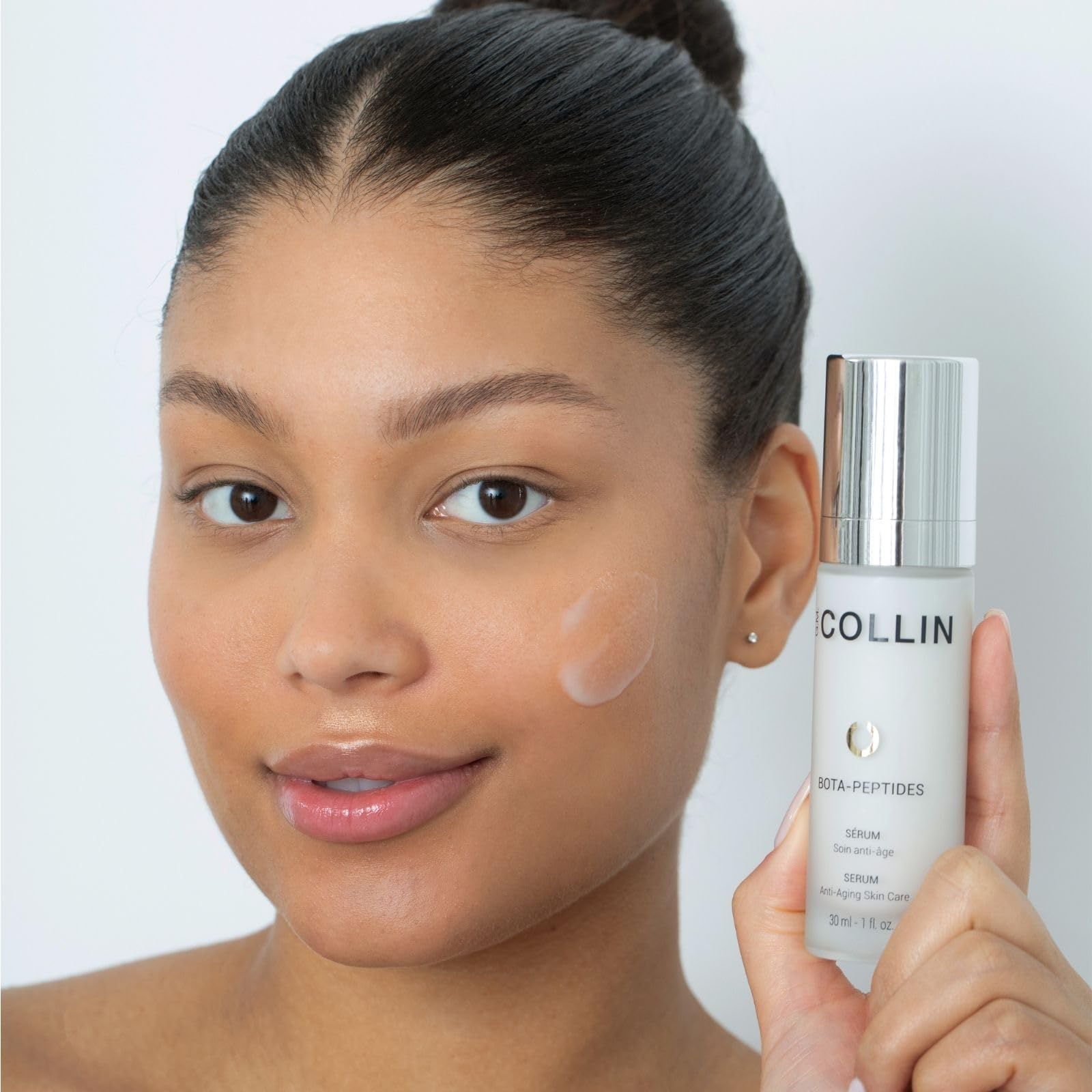 Close-up of G.M. COLLIN Bota-Peptides Serum texture on skin absorption