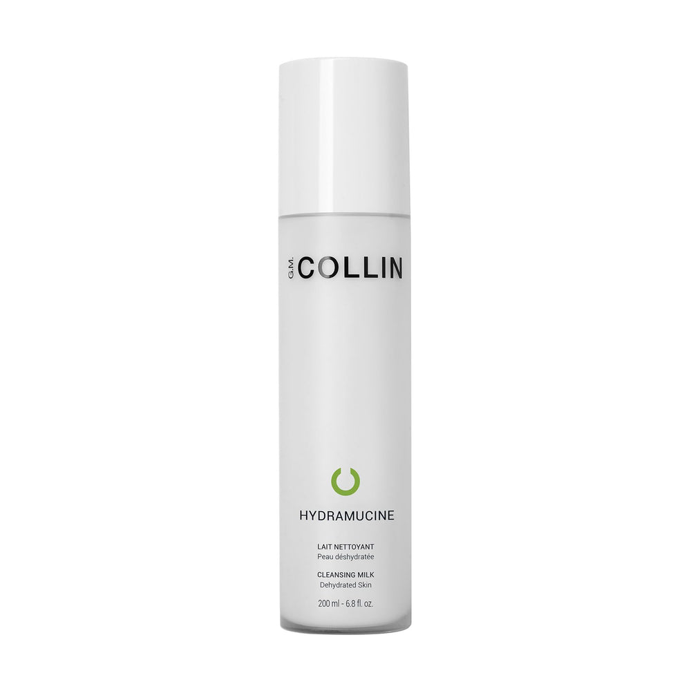 GM Collin Hydramucine Cleansing Milk bottle on bathroom counter for gentle cleansing