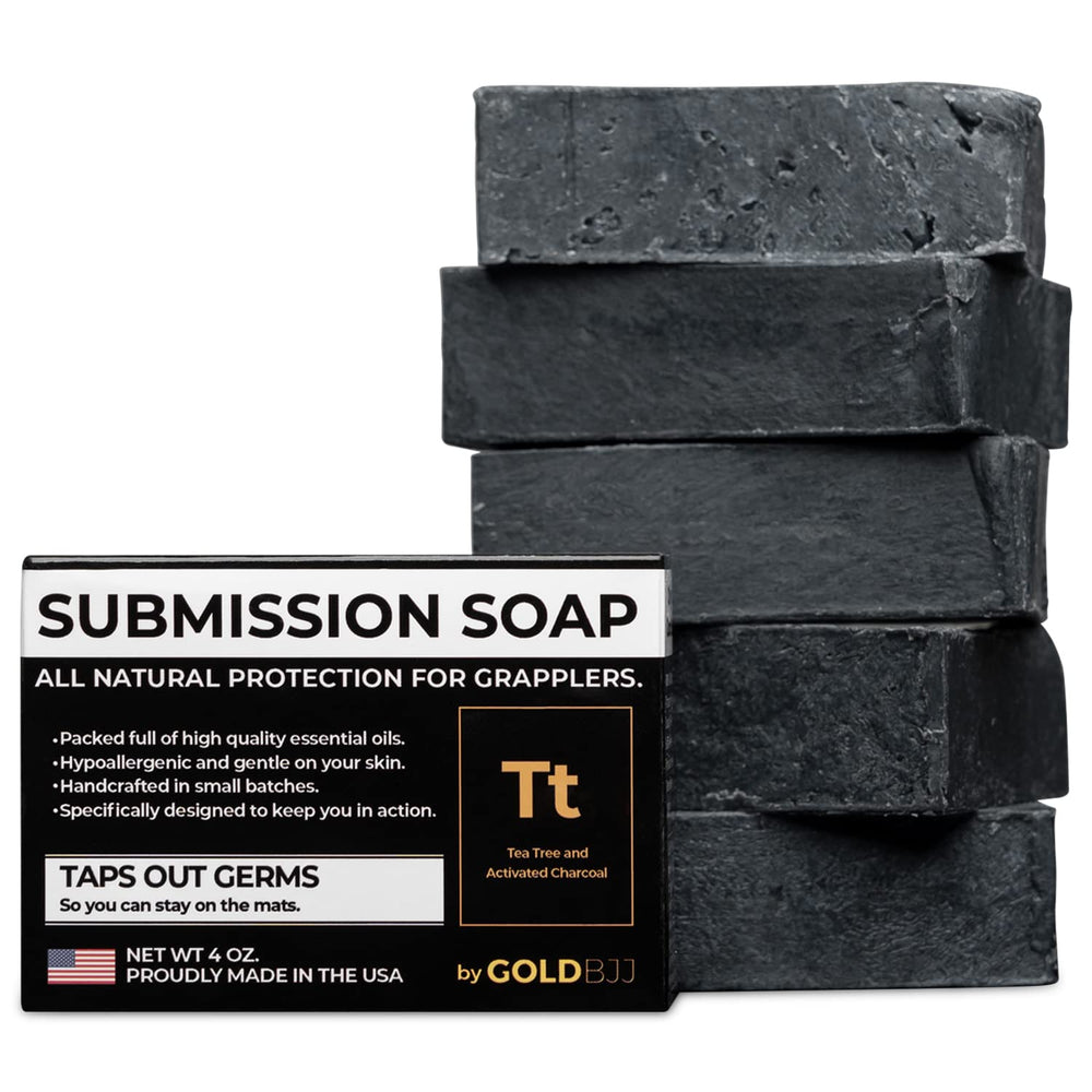 Gold BJJ premium tea tree oil soap bar on display for post-training refresh