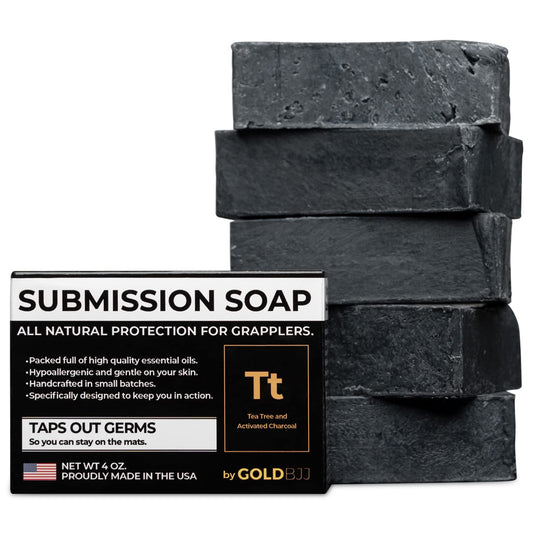 Gold BJJ premium tea tree oil soap bar on display for post-training refresh