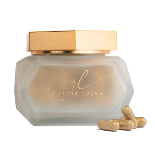 Goldie Locks hair growth bottle showing capsules for fuller hair.