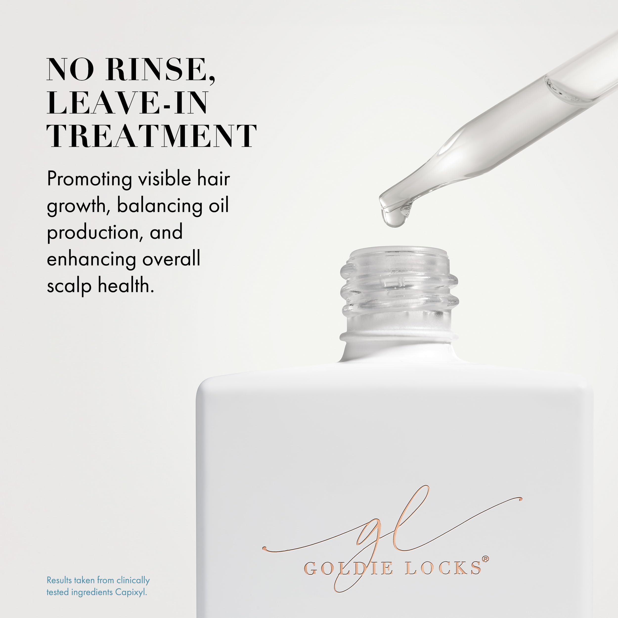 Goldie Locks Scalp Serum dropper close-up for precise dosing and scalp care.