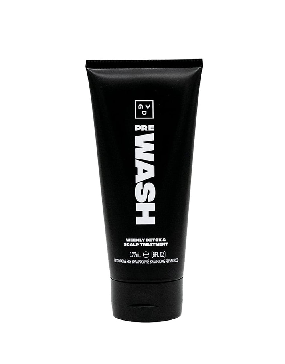 Good Dye Young scalp scrub bottle for gentle pre-wash cleansing.