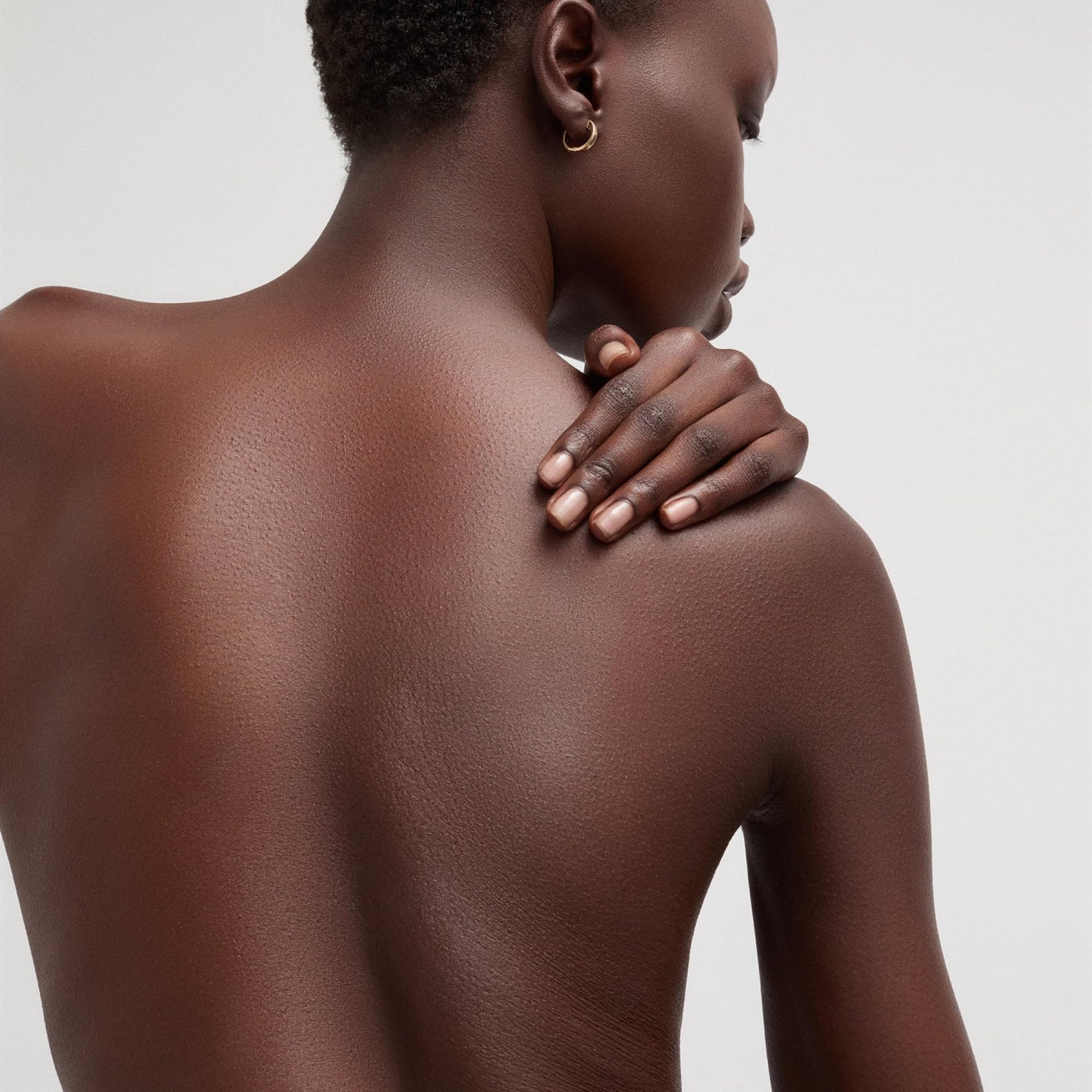Goop Beauty Body Butter ingredients banner features botanicals.