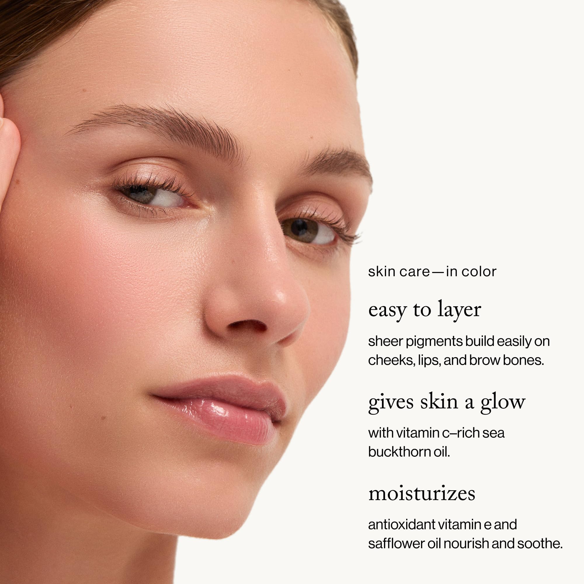 Close-up of fingers applying Velvelteen to cheek for easy fade.