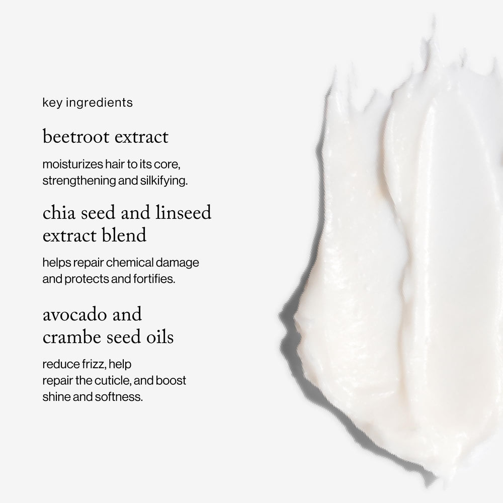 goop Beauty Hair Mask ingredients on a spoon showing beetroot and amino acids for stronger strands.