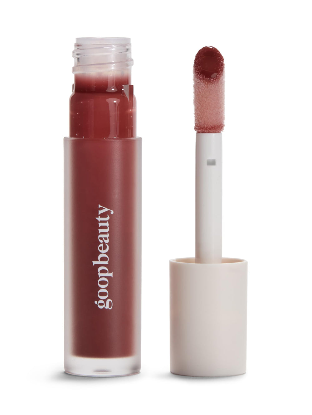 goop Hydra-Barrier Gel Gloss Spice bottle closeup showing hydrated lips