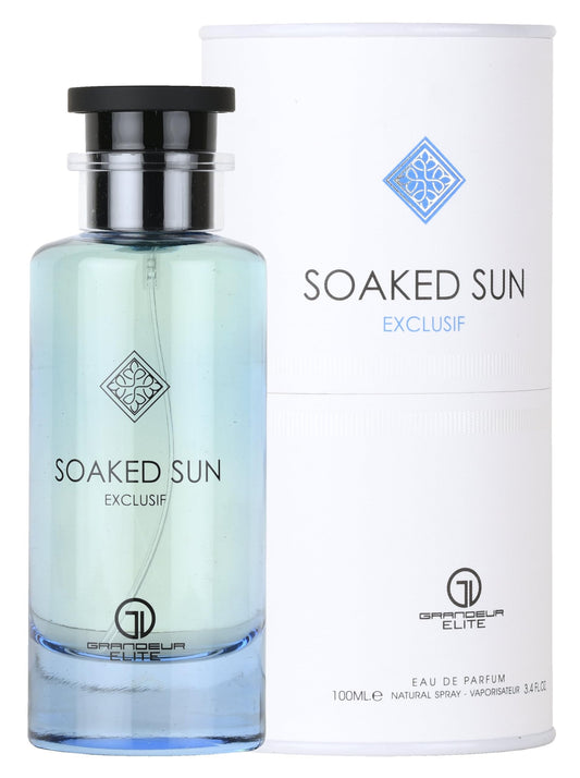 Grandeur Soaked Sun Exclusif bottle front, a warm, versatile scent for daily wear.