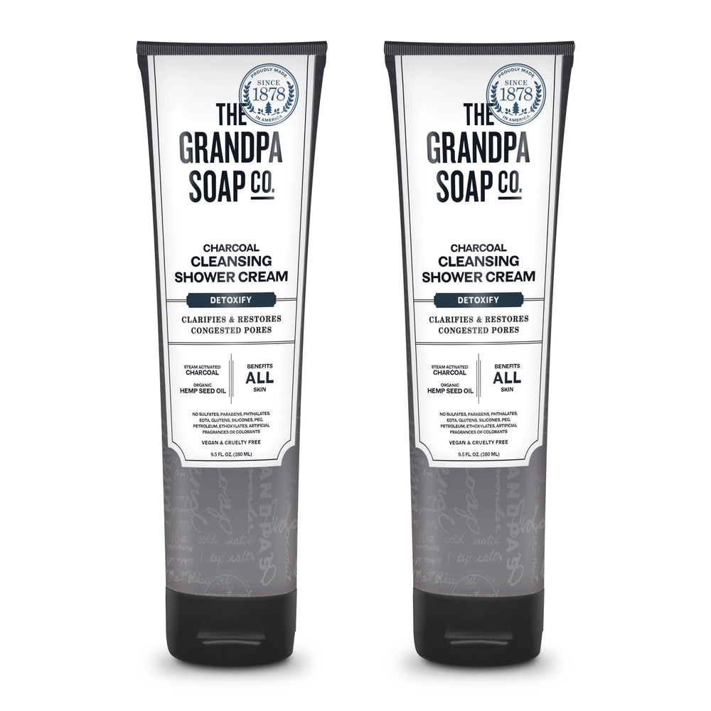 The Grandpa Soap Company charcoal shower cream bottle front highlights pore-clarifying charcoal benefits.