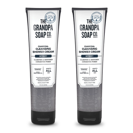 The Grandpa Soap Company charcoal shower cream bottle front highlights pore-clarifying charcoal benefits.