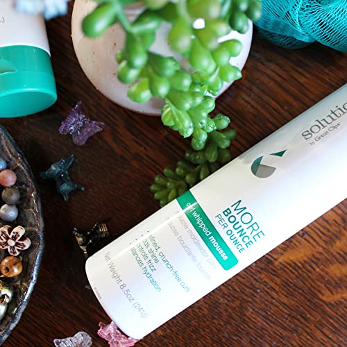 Great Clips Solutions Curl Whipped Mousse foam application supports controlled styling on damp hair.