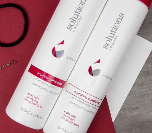Argan oil glow close-up beside GREAT CLIPS conditioner