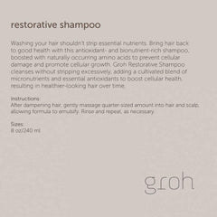 Hands massaging GROH Restorative Shampoo into scalp for follicle vitality.