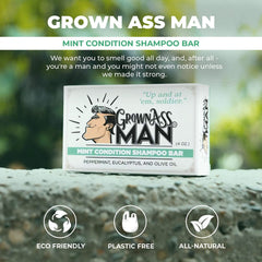 Grown Ass Man Co. solid shampoo bar on hair with conditioning oils.