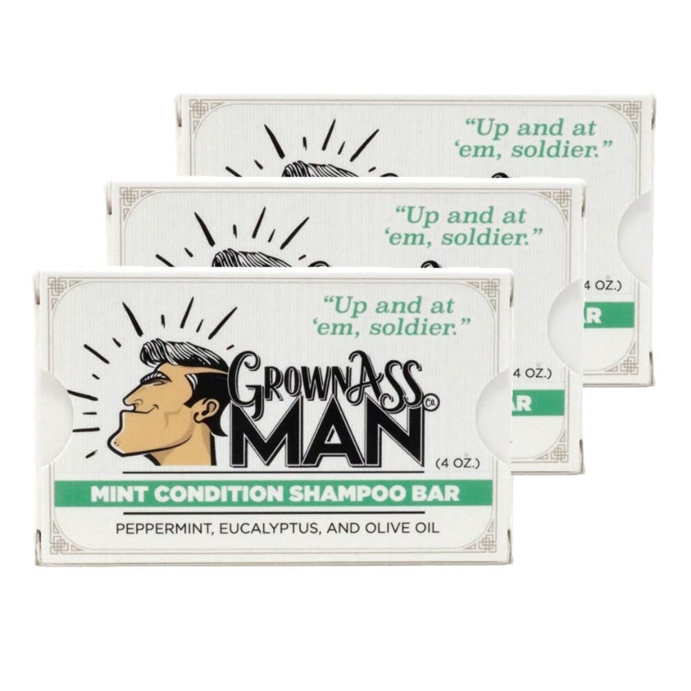 Grown Ass Man Co. solid shampoo bar lather close-up showing rich foam.