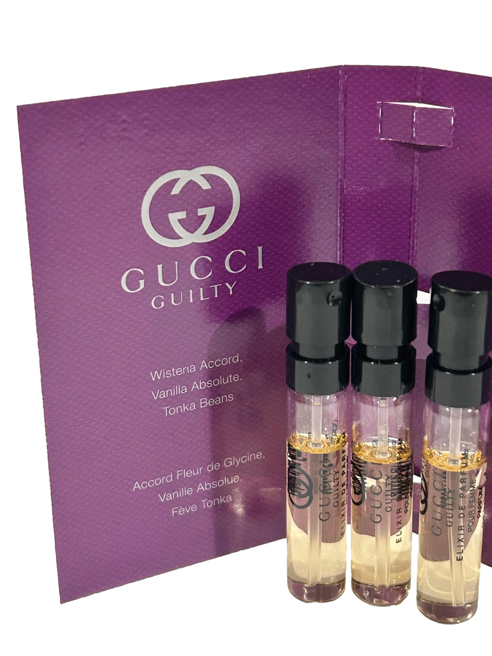 Gucci Guilty Elixir sample packaging set highlighting luxury tester