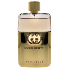 Gucci Guilty Pour Femme bottle close-up showing elegant label.
