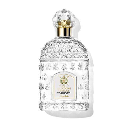 Guerlain Imperiale bottle front with elegant imperial bee motif for refined fragrance moments