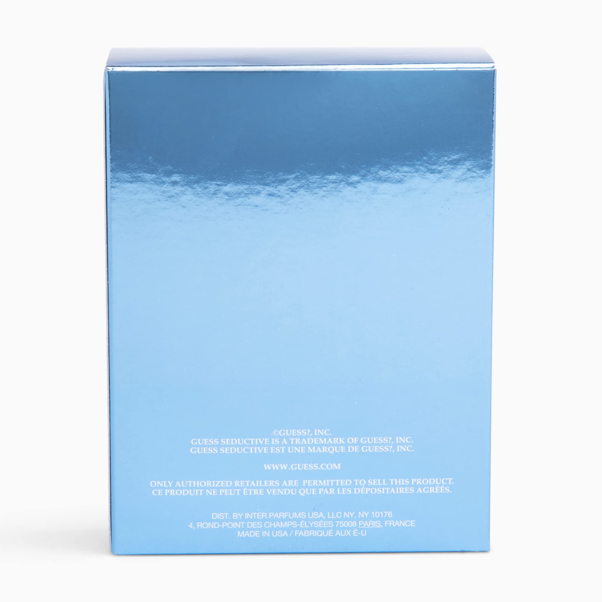 Guess Seductive Blue woody tones close-up highlight cashmere wood warmth.