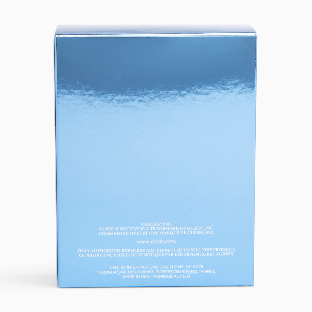 Guess Seductive Blue woody tones close-up highlight cashmere wood warmth.