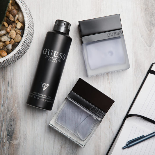 Guess Seductive Homme deodorizing body spray bottle for all-day freshness.